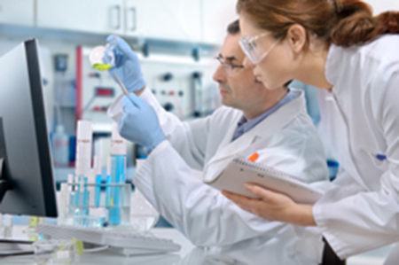 A picture of scientists working with deuterium oxide applications within the scientific research & manufacturing fields